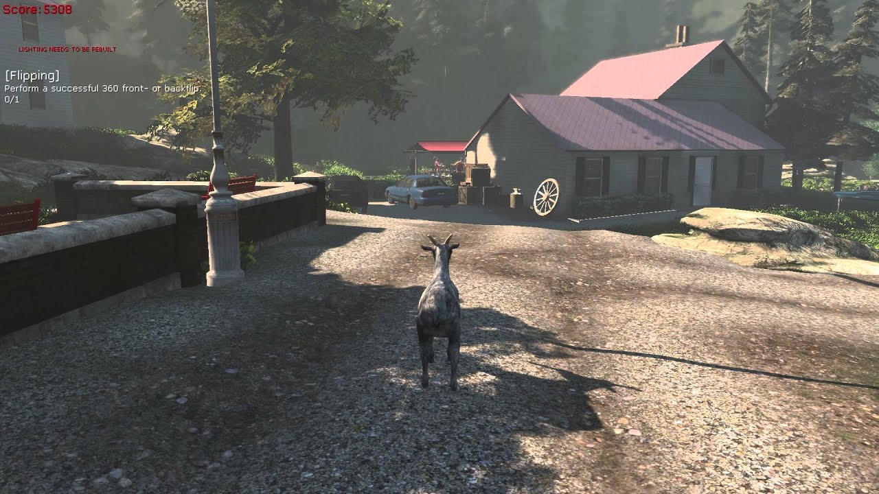 Goat Simulator 첫 알파 영상의 장면. 집 앞 자갈길에 선 염소. 왼쪽 위에 점수 5308, 바로 아래에 &lsquo;조명을 다시 빌드해야 함&rsquo;이라는 엔진 경고, 그 아래에 공중제비 도전 과제